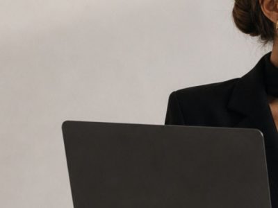 a bueautiful young woman with a laptop